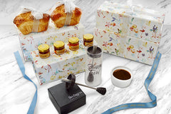 Rosh Hashana Table Gift Set with Gourmet Honey 3 - Challah Bread, jars of Honey, Honey jar with dipper, in floral gift box.